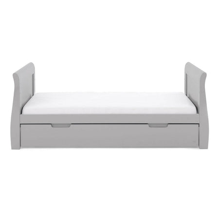 Obaby Stamford Sleigh Cot Bed with Drawer (Warm Grey) - side view, shown here as the junior bed (mattress and bedding not included, available separately)