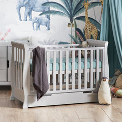 Obaby Stamford Mini Sleigh 2 Piece Room Set (Warm Grey) - lifestyle image, shown here with the cot bed (bedding, mattress, toys and changing mat not included)