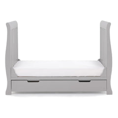 Obaby Stamford MINI Sleigh Cot Bed with Drawer (Warm Grey) - side view, shown here as the junior bed (mattress not included)