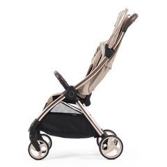 eggZ Stroller (Feather) - side view, showing the stroller with iits seat upright, its hood retracted and its leg rest lowered
