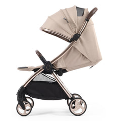 eggZ Stroller (Feather) - side view, showing the stroller with the seat fully reclined, hood fully extended showing the ventilation panel and the leg rest raised