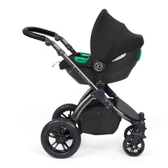 Ickle Bubba Stomp LUXE Travel System with Cirrus Car Seat & ISOFIX Base (Black/Charcoal/Black) - showing the Cirrus i-Size Car Seat fixed to the pushchair`s chassis