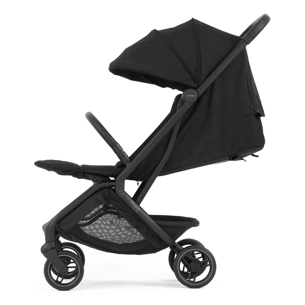 Oyster F-Lite Stroller - Liquorice - side view with seat reclined and calf rest raised