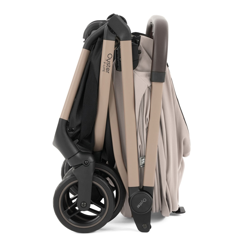 Oyster F-Lite Stroller - Putty - folded with seat attached