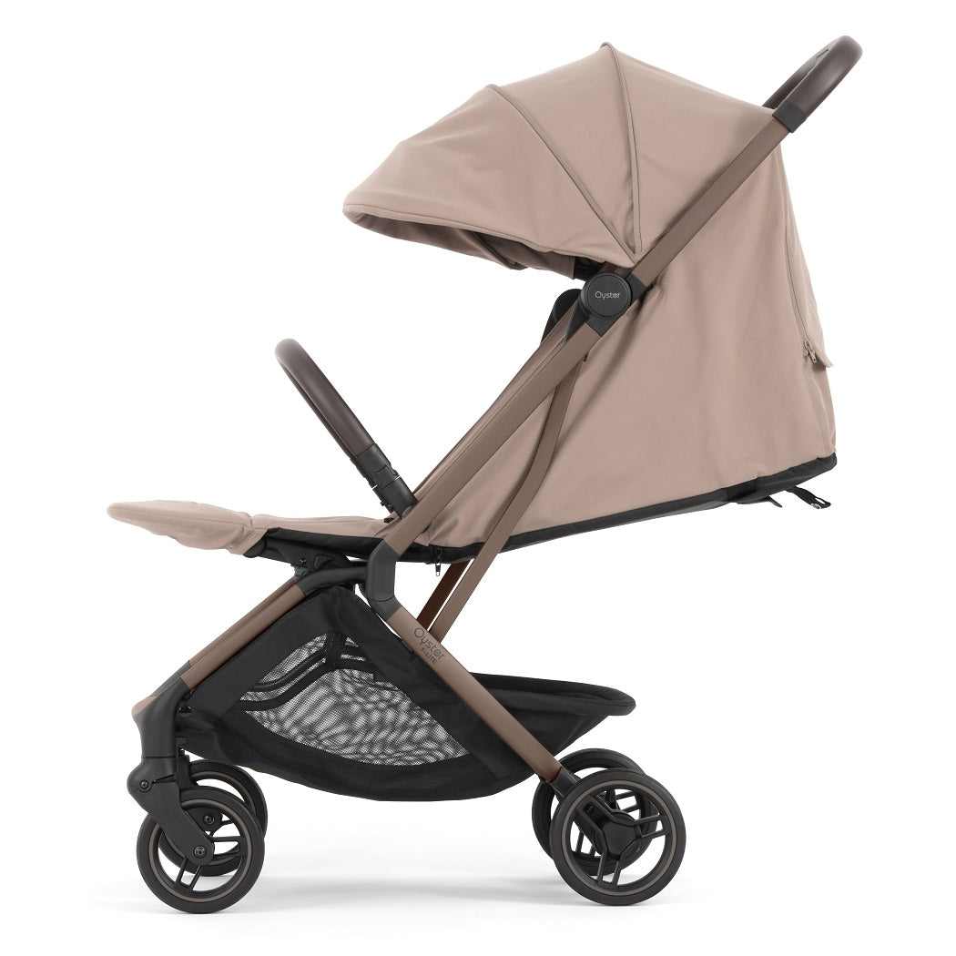 Oyster F-Lite Stroller - Taupe - side view with seat reclined and calf rest raised