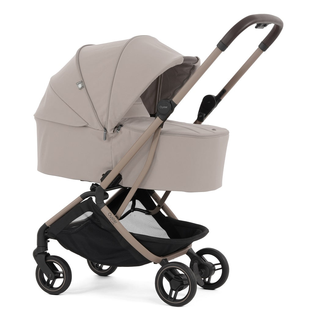Oyster F-Lite Carrycot - Putty - shown as a pram with the F-Lite chassis (matching stroller available separately)