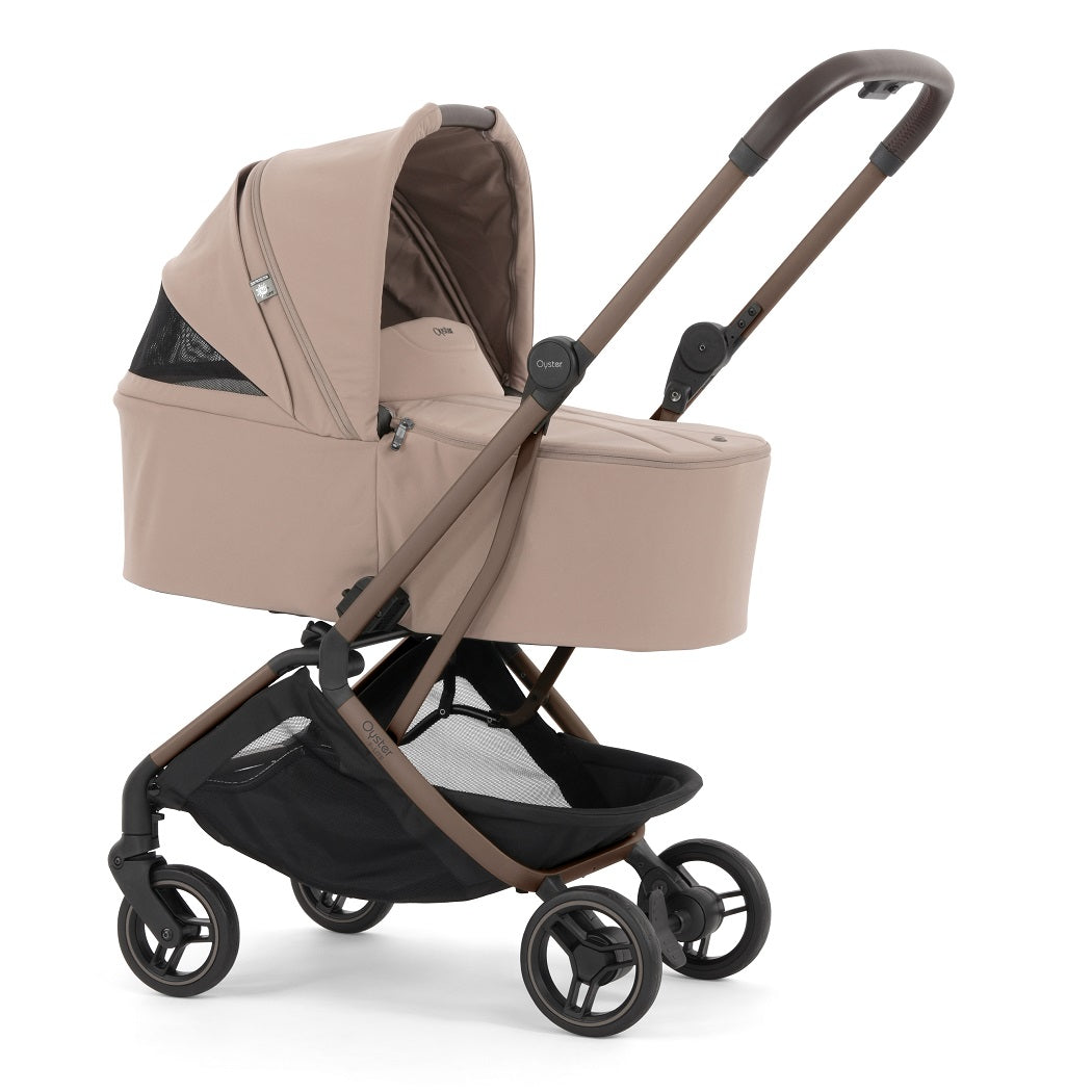 Oyster F-Lite Carrycot - Taupe - showing the hood`s integrated ventilation panel