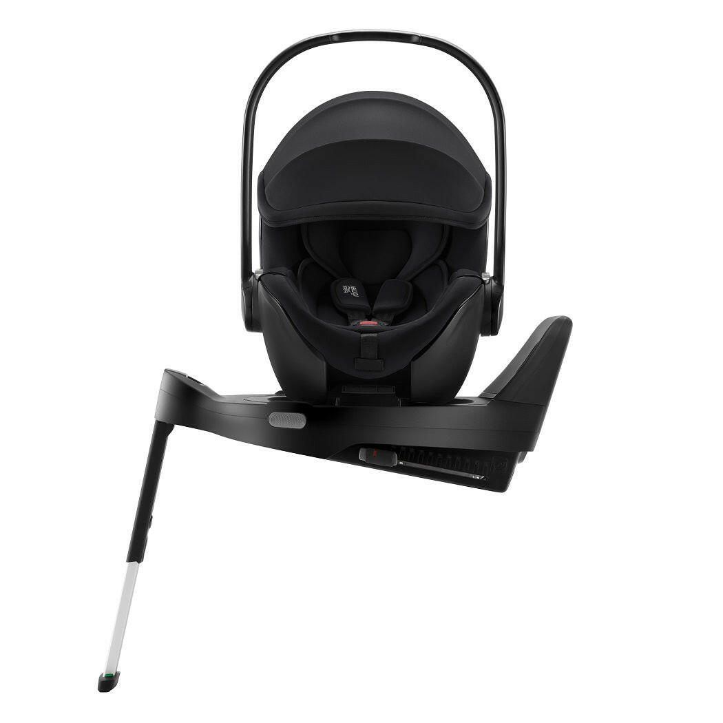 Britax Baby-Safe PRO i-Size Car Seat - Space Black - side view, fitted to optional ISOFIX base with seat turned towards car door