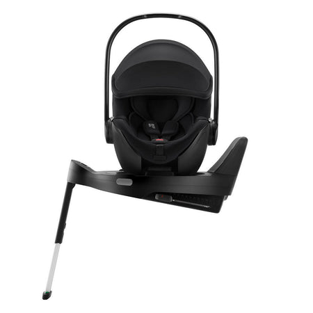Britax Baby-Safe PRO i-Size Car Seat - Space Black - side view, fitted to optional ISOFIX base with seat turned towards car door