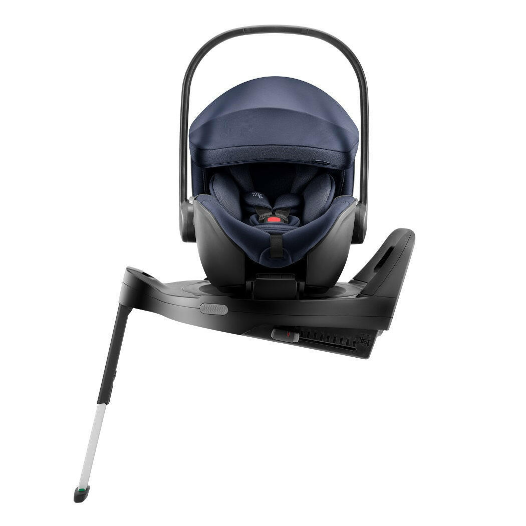 Britax Baby-Safe PRO i-Size Car Seat - Night Blue - side view, fitted to optional ISOFIX base with seat turned towards car door