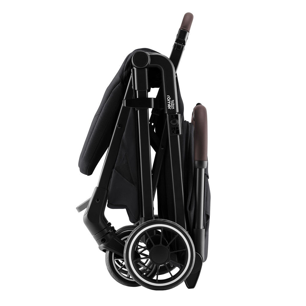 Britax Tira Lightweight Stroller - Carbon Black - side view, folded and free-standing