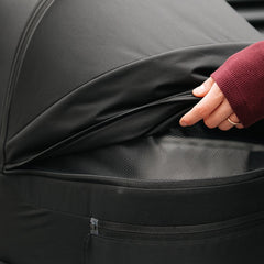 Venicci Claro 2 pram in Noir showing hood ventilation panel