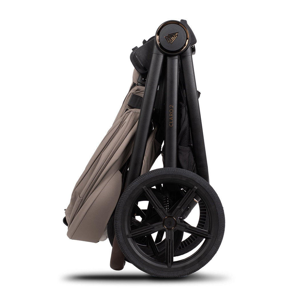 Venicci Claro 2 pushchair folded side view in Almond