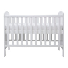 Ickle Bubba Coleby MINI Cot Bed - White - side view, mattress base at highest level
