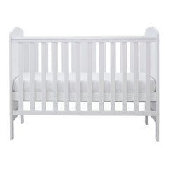 Ickle Bubba Coleby MINI Cot Bed - White - side view, mattress base at middle level