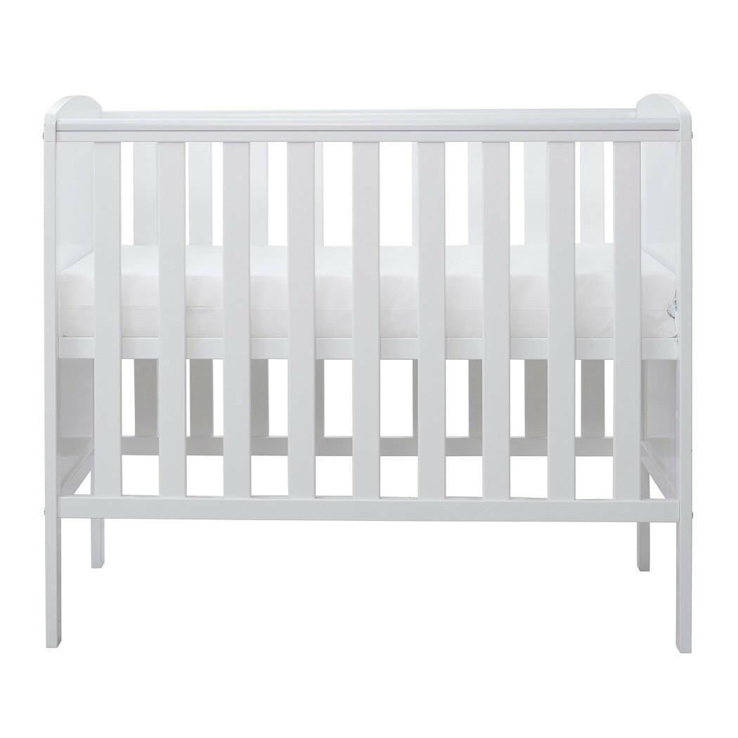 Ickle Bubba Coleby Space Saver Cot - White - side view, with mattress base at highest level