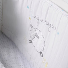 Silvercloud Counting Sheep 3 Piece Bedding Bale (Night Night Sleep Tight) - showing the cot bumper fitted to a cot (spotted fitted sheet not included)