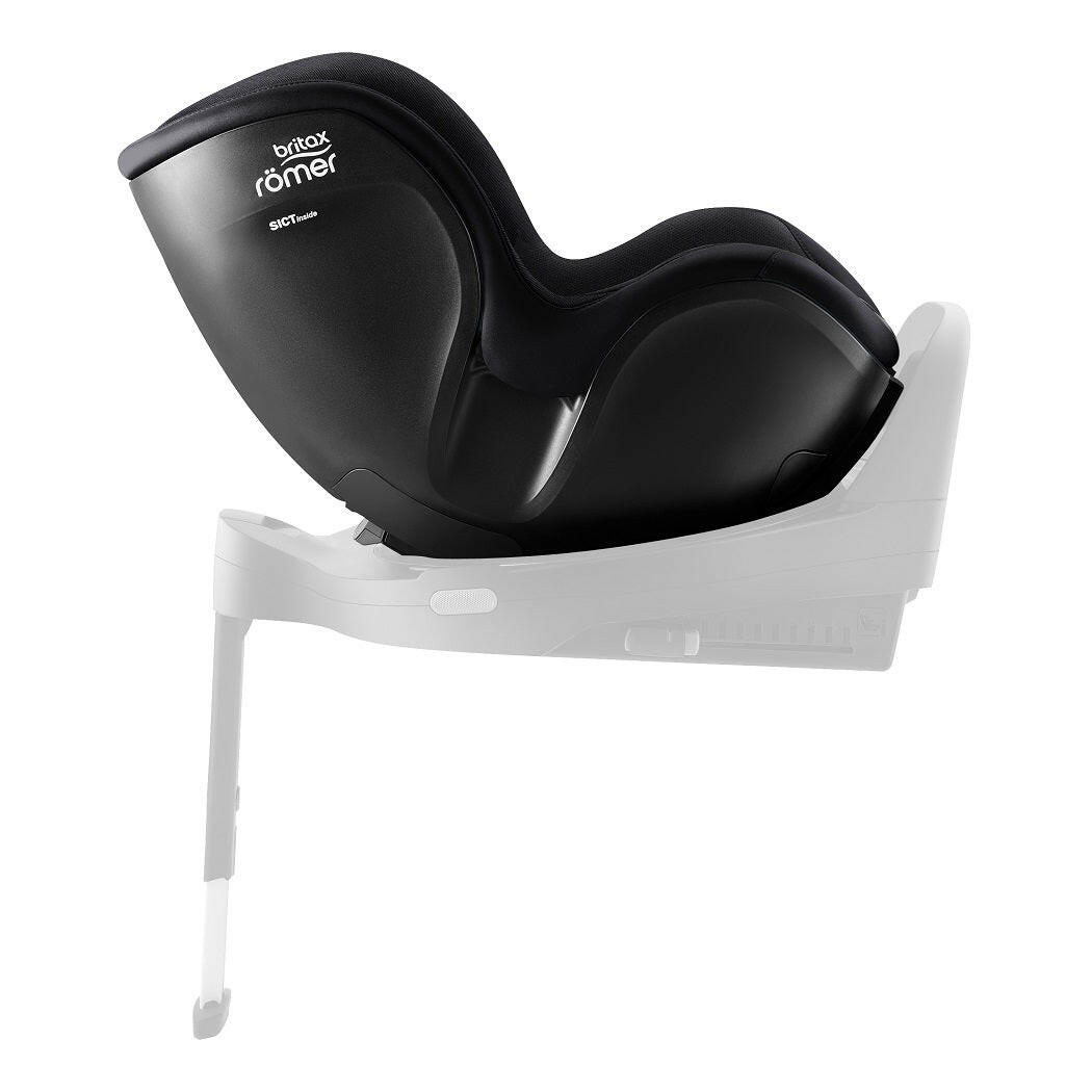 Britax DualFix 5Z Car Seat - Style Carbon Black - side view, rear-facing and fitted to the ISOFIX base