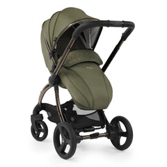 egg2 Luxury Bundle (Hunter Green) - showing the seat unit and chassis together as the pushchair in parent-facing mode with its matching apron