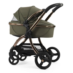 egg3 Luxury Bundle (Hunter Green) - showing the carrycot and chassis together as the pram with its hood fully extended and ventilation panel opened