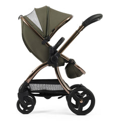 egg3 Luxury Bundle (Hunter Green) - side view, showing the parent-facing pushchair