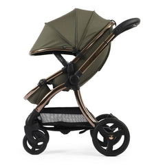 egg3 Luxury Bundle (Hunter Green) - side view, showing the forward-facing pushchair with its hood fully extended