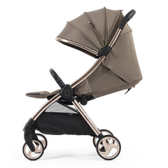 eggZ Stroller (Mink) - side view, showing the stroller with its seat fully reclined, leg rest raised and hood fully extended