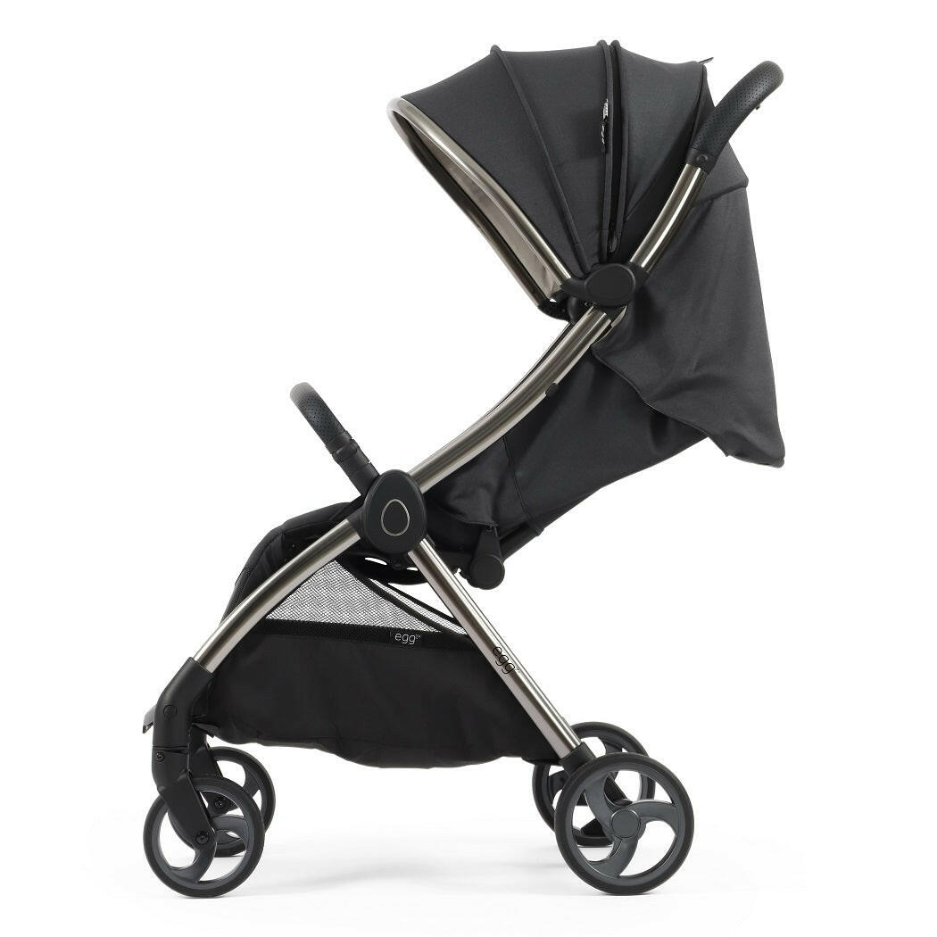 eggZ Stroller - Carbonite - side view, with seat slightly reclined and hood extended