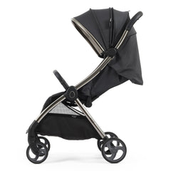 eggZ Stroller (Carbonite) - side view, showing the stroller with its seat slightly reclined and its hood extended