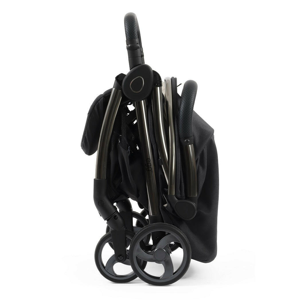 eggZ Stroller - Carbonite - side view, folded and freestanding