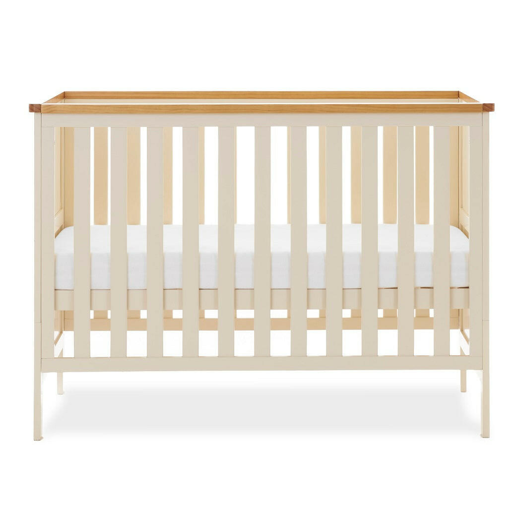 Obaby Evie MINI Cot Bed - Cashmere - showing the mini cot with its mattress base at the middle level