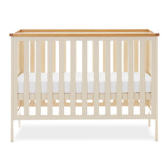 Obaby Evie MINI Cot Bed - Cashmere - showing the mini cot with its mattress base at the middle level