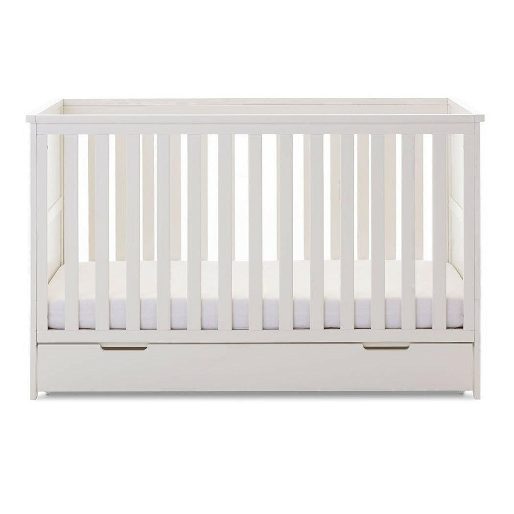 Obaby Evie Cot Bed with Under Drawer (140x70cm) White - shown with the mattress base at its lowest level
