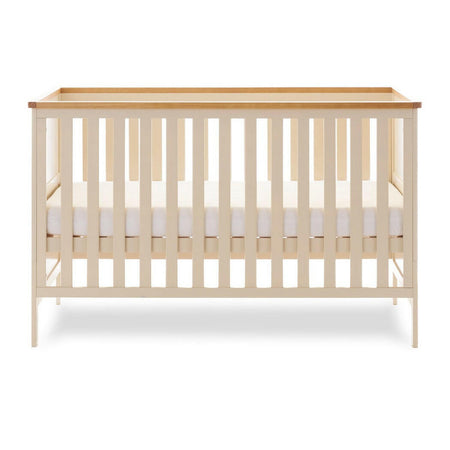 Obaby Evie Cot Bed - Cashmere - showing the cot with its mattress base at the middle level