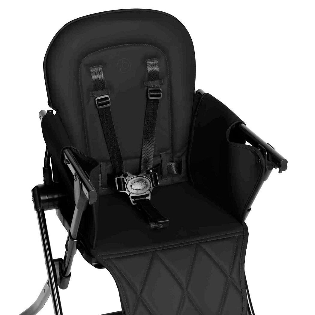 Ickle Bubba Flip Pro Magic Fold Highchair - Black - close up of seat with safety harness