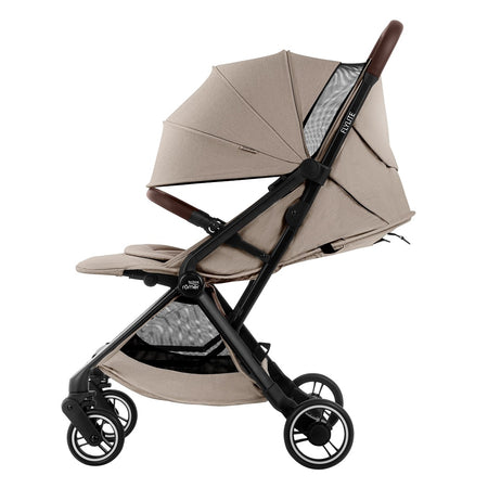 Britax Flylite Travel Stroller - Teak - side view with seat reclined, hood fully extended and leg rest raised