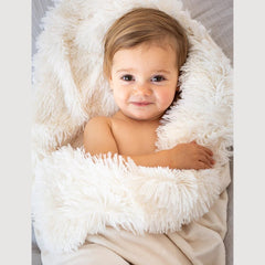 Bizzi Growin Koochicoo Soft & Fluffy Baby Blanket (Porcelain Cream) - lifestyle image, showing the fluffy exterior and the soft velour reverse