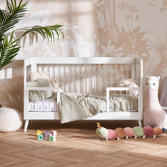 Obaby Maya Cot Bed (White with Acrylic) - shown here as the junior bed with the safety rails installed