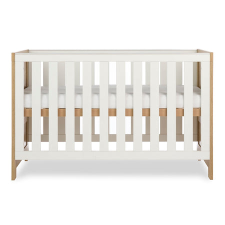 Obaby Nika Cot Bed Oak & White - with mattress base at highest level