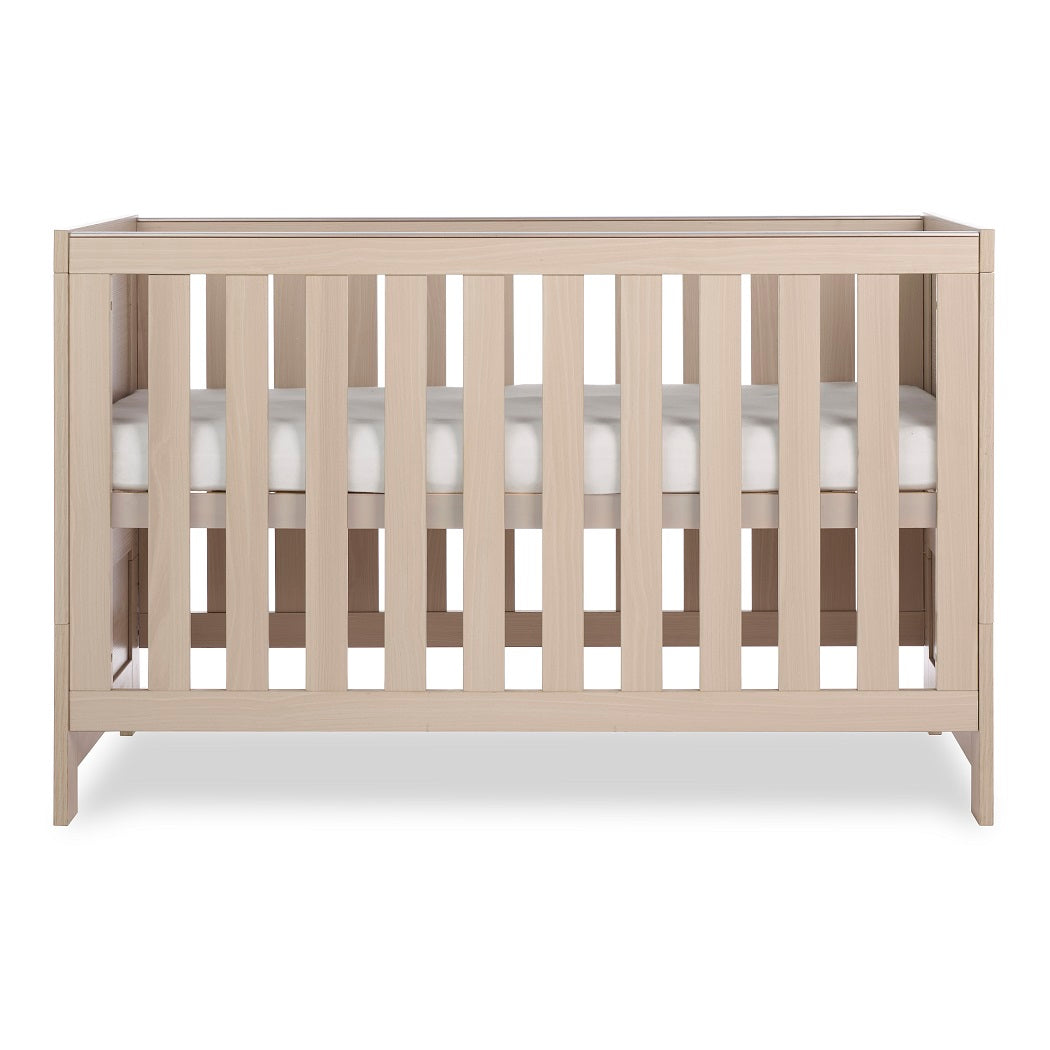 Obaby Nika Cot Bed Aspen - side view, mattress base at highest level