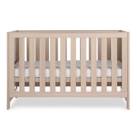 Obaby Nika Cot Bed Aspen - side view, mattress base at middle level