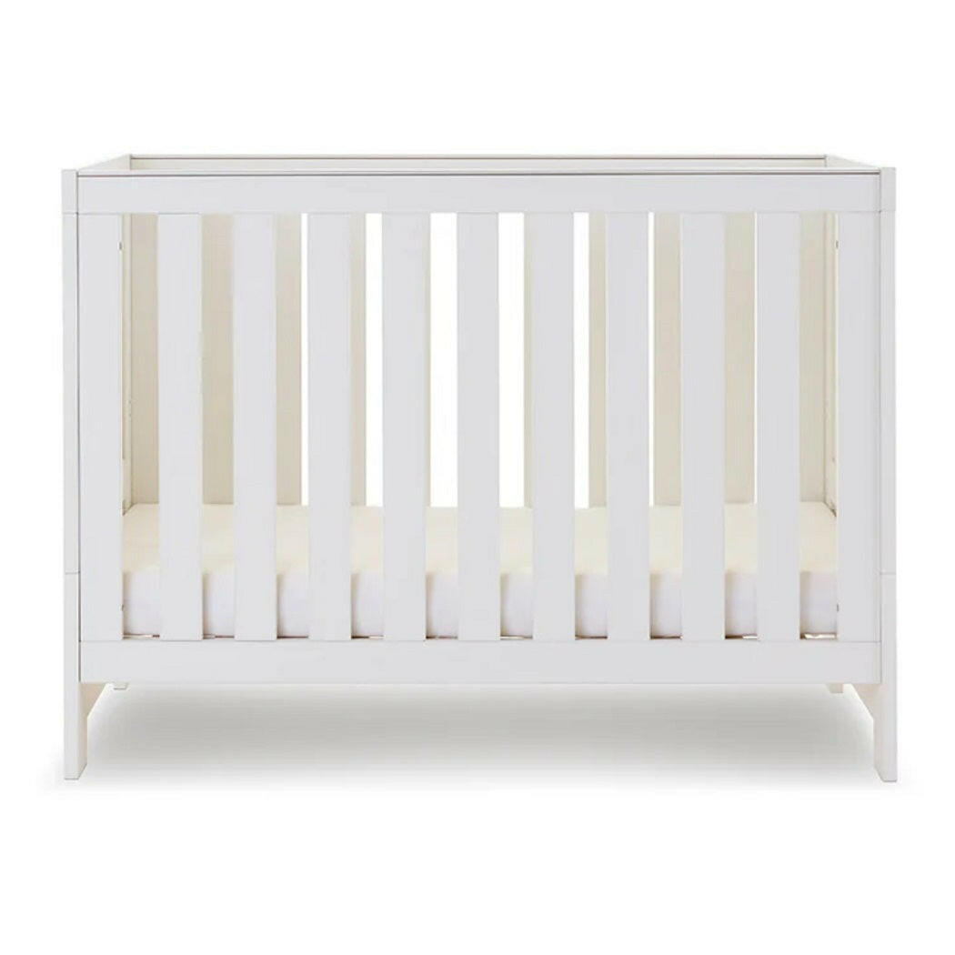 Obaby Nika MINI Cot - White Wash - with mattress base at lowest level
