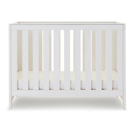 Obaby Nika MINI Cot - White Wash - with mattress base at lowest level