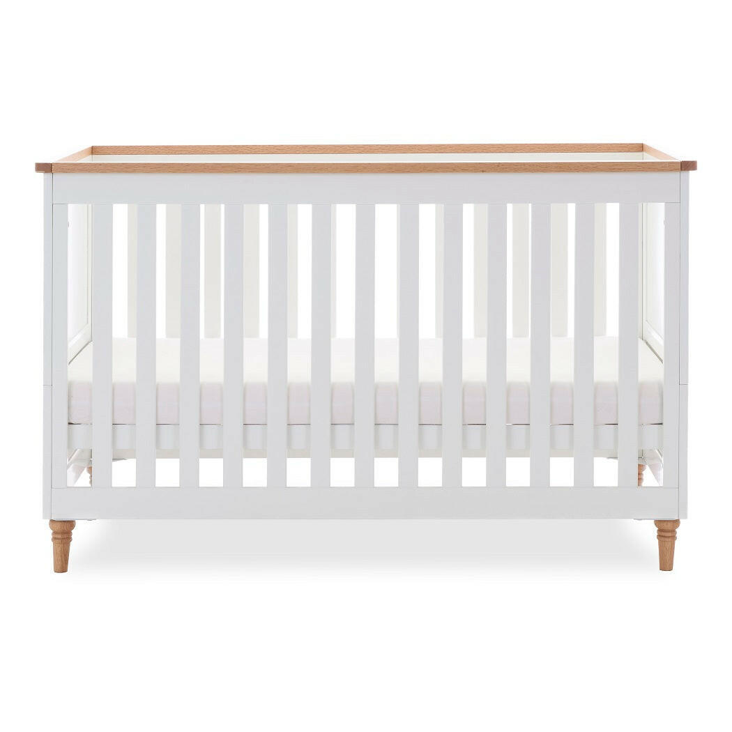 Obaby Orla Cot Bed - White with Oak - shown with mattress base at middle level