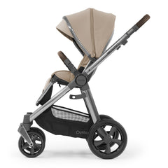 BabyStyle Oyster 3 Gunmetal LUXURY Bundle (Butterscotch) with Maxi-Cosi CabrioFix - showing the forward-facing pushchair with its seat upright