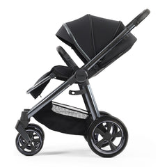 BabyStyle Oyster 3 Gunmetal ESSENTIAL Bundle (Carbonite) - side view, showing the forward-facing pushchair with its seat upright