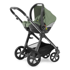 BabyStyle Oyster 3 Gunmetal LUXURY Bundle (Spearmint) - showing the car seat fitted onto the chassis using the included adaptors