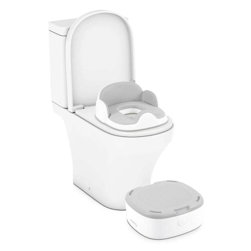 BabyStyle Oyster 4in1 Potty - White - seat unit and stool - being used with adult toilet