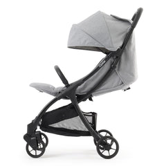BabyStyle Oyster Pearl Stroller (Moon) - side view, showing the stroller with its seat reclined, hood lowered and leg rest raised