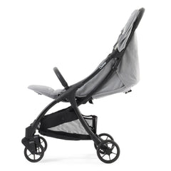 BabyStyle Oyster Pearl Stroller (Moon) - side view, showing the stroller with its seat reclined, hood lowered and leg rest raised